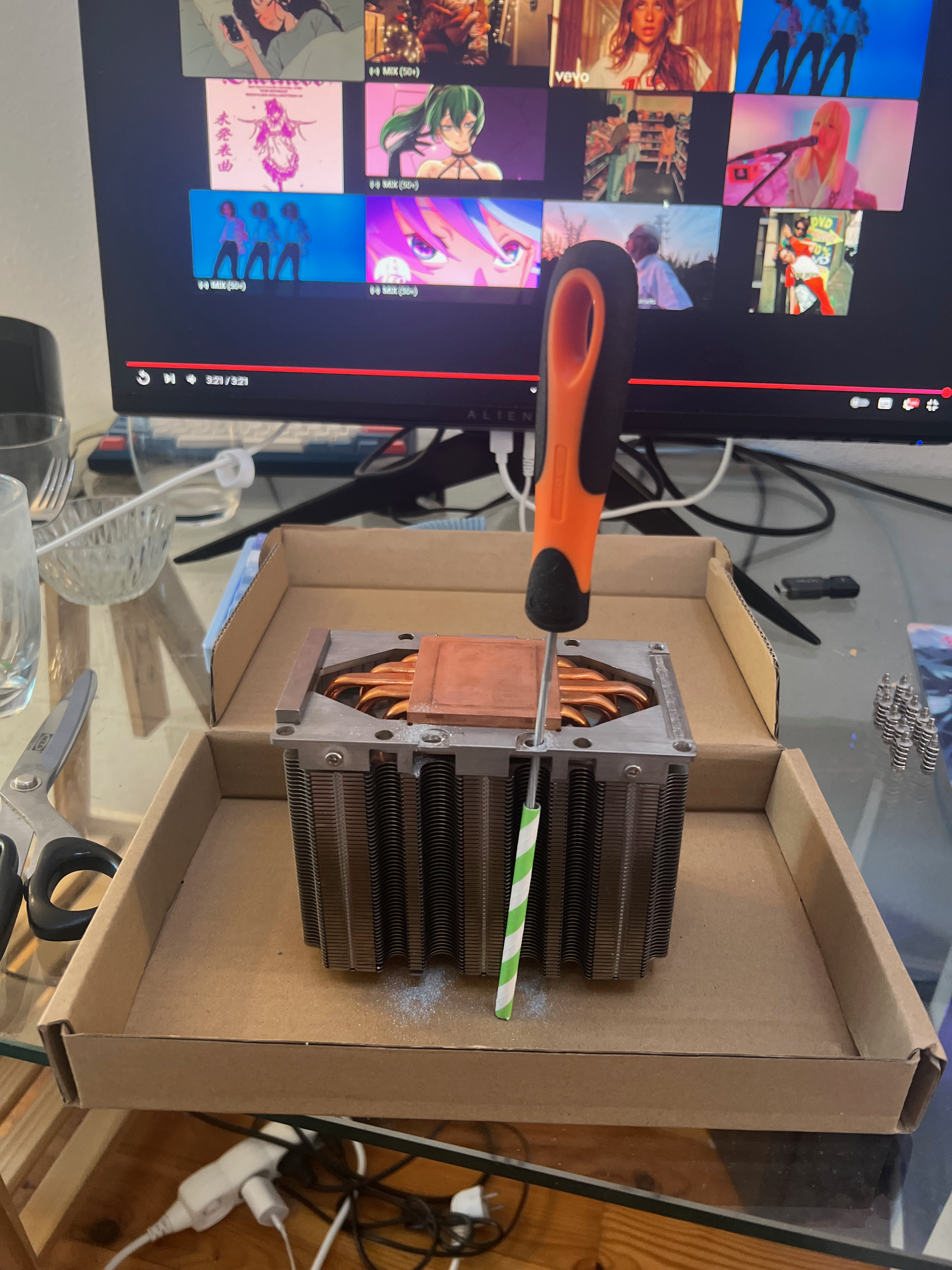 Picture of the filing setup. It took multiple days to file the 4 heatsinks because it hurts my wrist pretty fast.